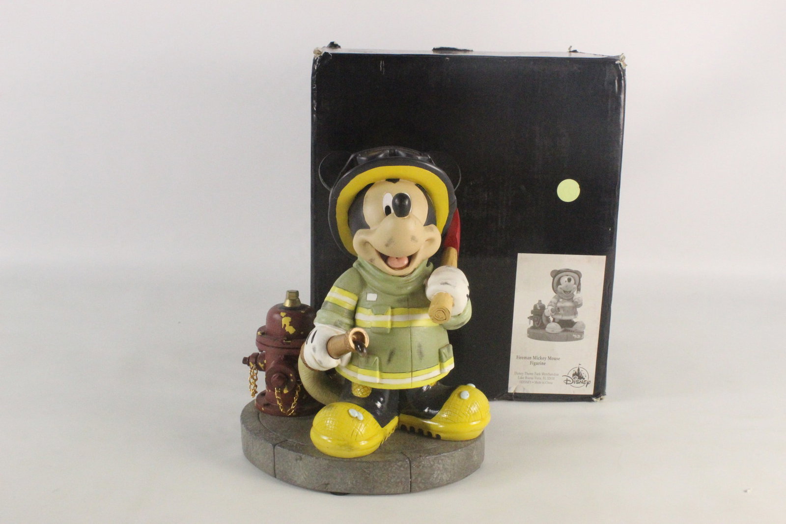 Disney Parks Fireman Mickey Mouse Exclusive Figurine - Medium: Disney Parks Fireman Mickey Mouse Medium Sized Exclusive Figurine. Designed by artist Richard Sznerch. Comes with original box. Measures 9 1/2 inches tall by 8 inches wide. All invoices must be paid w