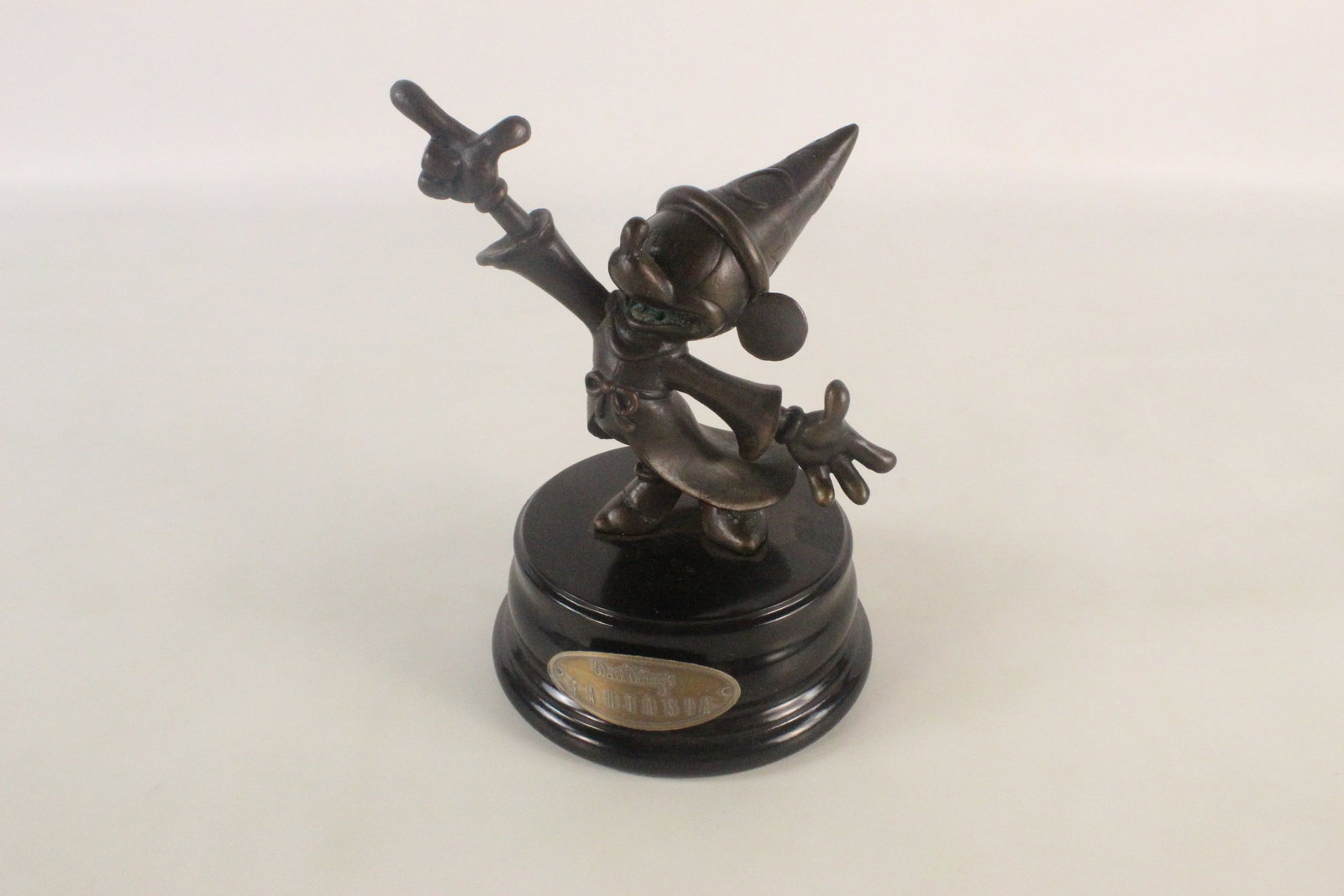 Bronze Walt Disney Fantasia Sorcerer Mickey Statue: Bronze Walt Disney Fantasia Sorcerer Mickey Statue. Limited Edition of 1500. Does have some tarnishing throughout. Measures 7 1/2 inches tall by 5 1/2 inches wide. All invoices must be paid within 24 