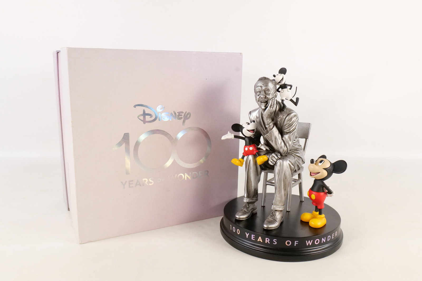 100 Years of Wonder Walt Disney and Mickey Through the Year Statue: Disney Grand Jester Studios 100 Years of Wonder Walt Disney and Mickey Through the Year Statue - Walt Disney Showcase Collection. The Steamboat Willie Mickey has broken off Walt's shoulder and has bee
