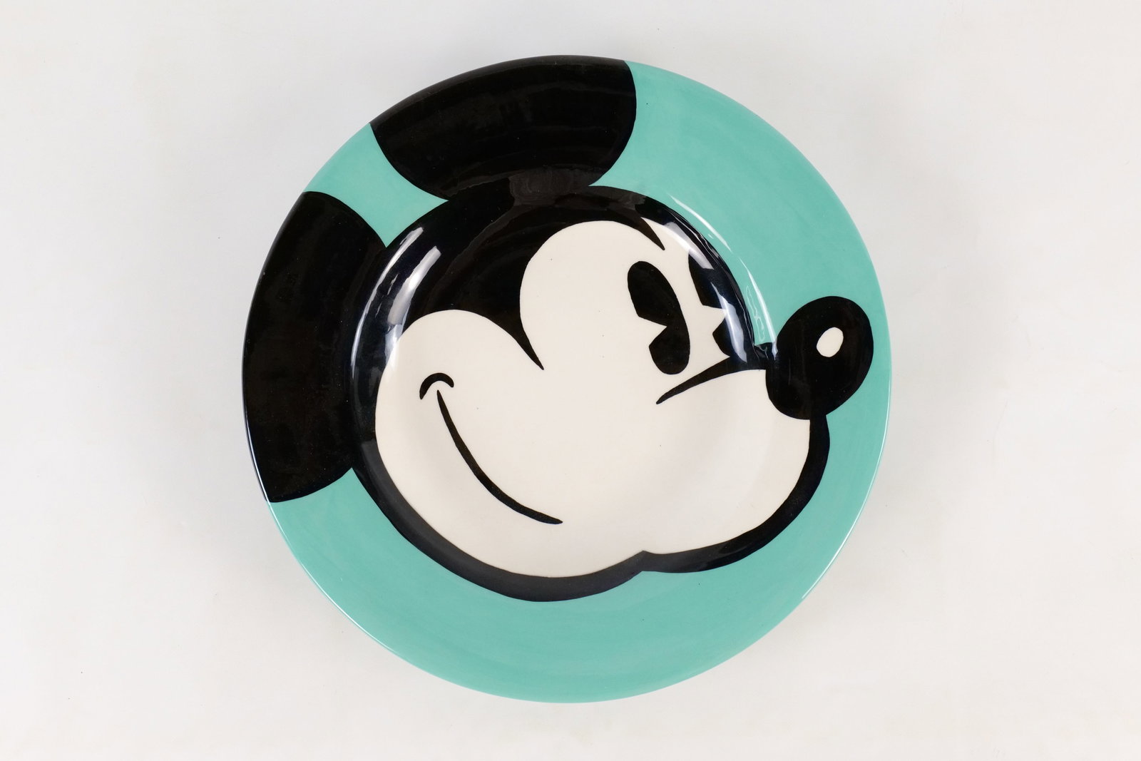 Square One Disney Mickey Mouse Ceramic Hand Painted Charger/Bowl: Square One Disney Mickey Mouse Ceramic Hand Painted Charger/Bowl. Artist signed on bottom and dated '94. Limited Edition #15 of 25. Vibrant Teal Color. Measures 12 1/2 inches in diameter. All invoices