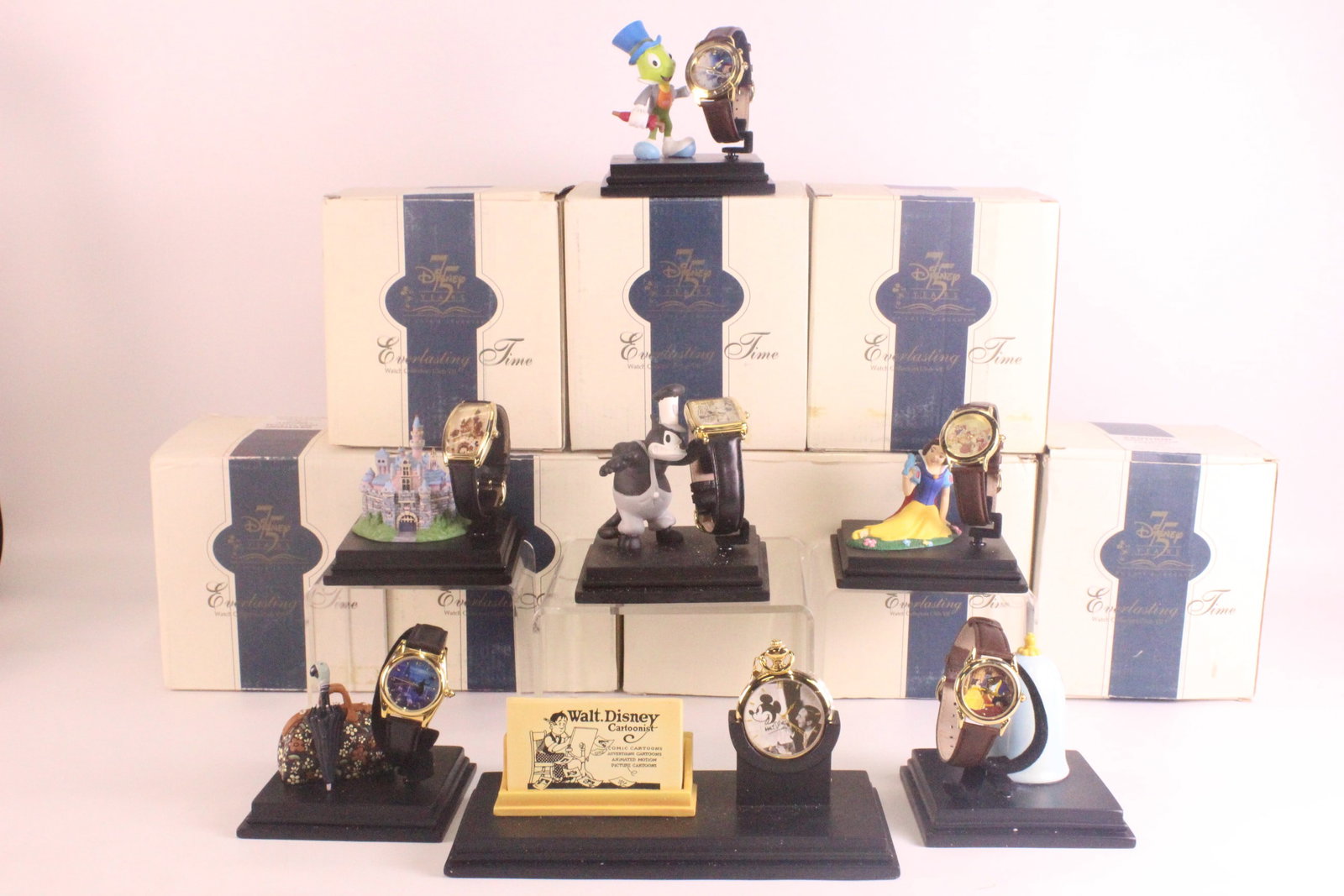 Disney Watch Collectors Club Series VII Everlasting Time Complete Watch Set: Disney Watch Collectors Club Series VII Everlasting Time Complete Watch Set. Watches are Fossil. Including 7 Pieces. 75 Years of love and Laughter 1998. Limited edition to 7500 pieces. Includes Steamb