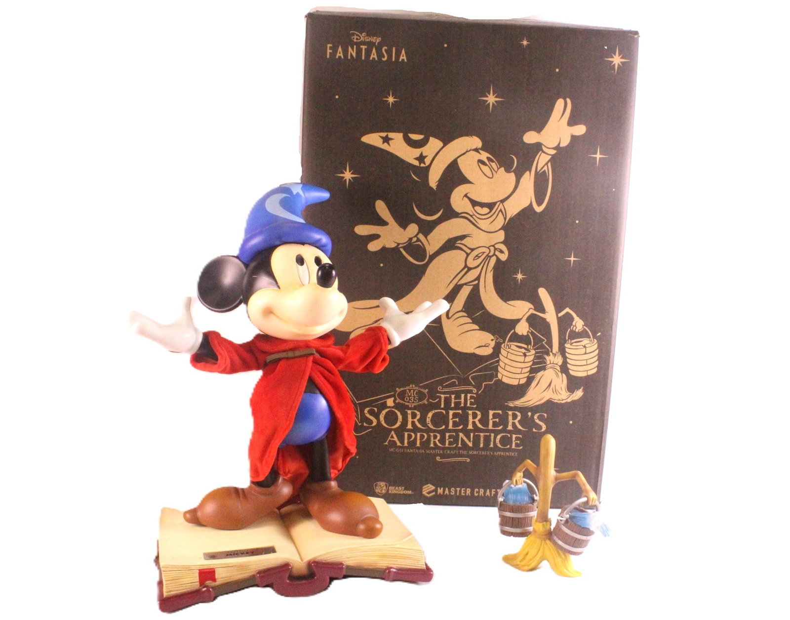 Disney Beast Kingdom Mastercraft Fantasia Mickey Figurine: Disney Beast Kingdom Mastercraft Fantasia Mickey Figurine. Mickey Mouse as Sorcerer's Apprentice. Limited Edition #2164 of 3000. Breaks apart in many pieces. Comes with original box. Mickey has a scra