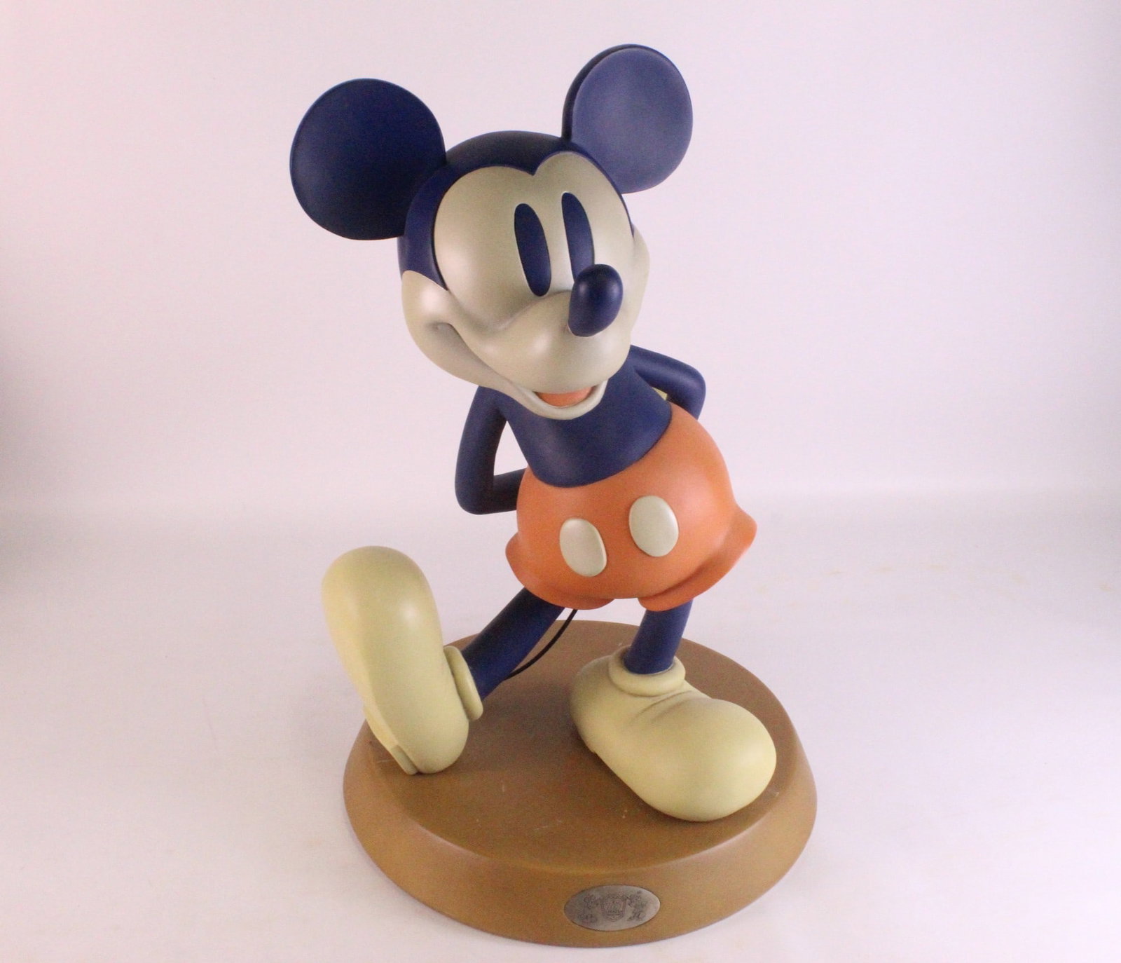 Disney Mickey Mouse 75 Years Together Big Fig Statue: Disney Mickey Mouse 75 Years Together Big Fig. Comes with base. Base has significant scuffing and scratching throughout. Mickey has a little bit of scuffing on his body as well. Measures 19 inches tal