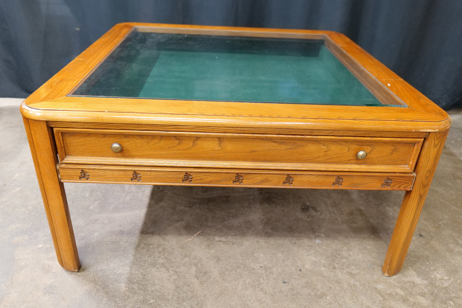 Disney Mickey Mouse Shadowbox Coffee Table: Disney Mickey Mouse Shadowbox Coffee Table. Has images of Mickey Mouse along the bottom edge of all four sides. Has a large pull out draw lined with green felt. Outside is made of wood. Some scratchin