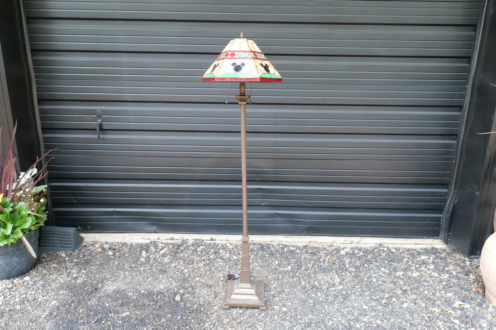 Disney Tiffany Style Stained Glass Floor Lamp: Disney Tiffany Style Stained Glass Floor Lamp. Depicting Mickey Mouse Silhouettes around the edge. Rare - Limited Edition. Lamp measures 59 inches tall. Shade measures 16 inches in diameter. All invoi