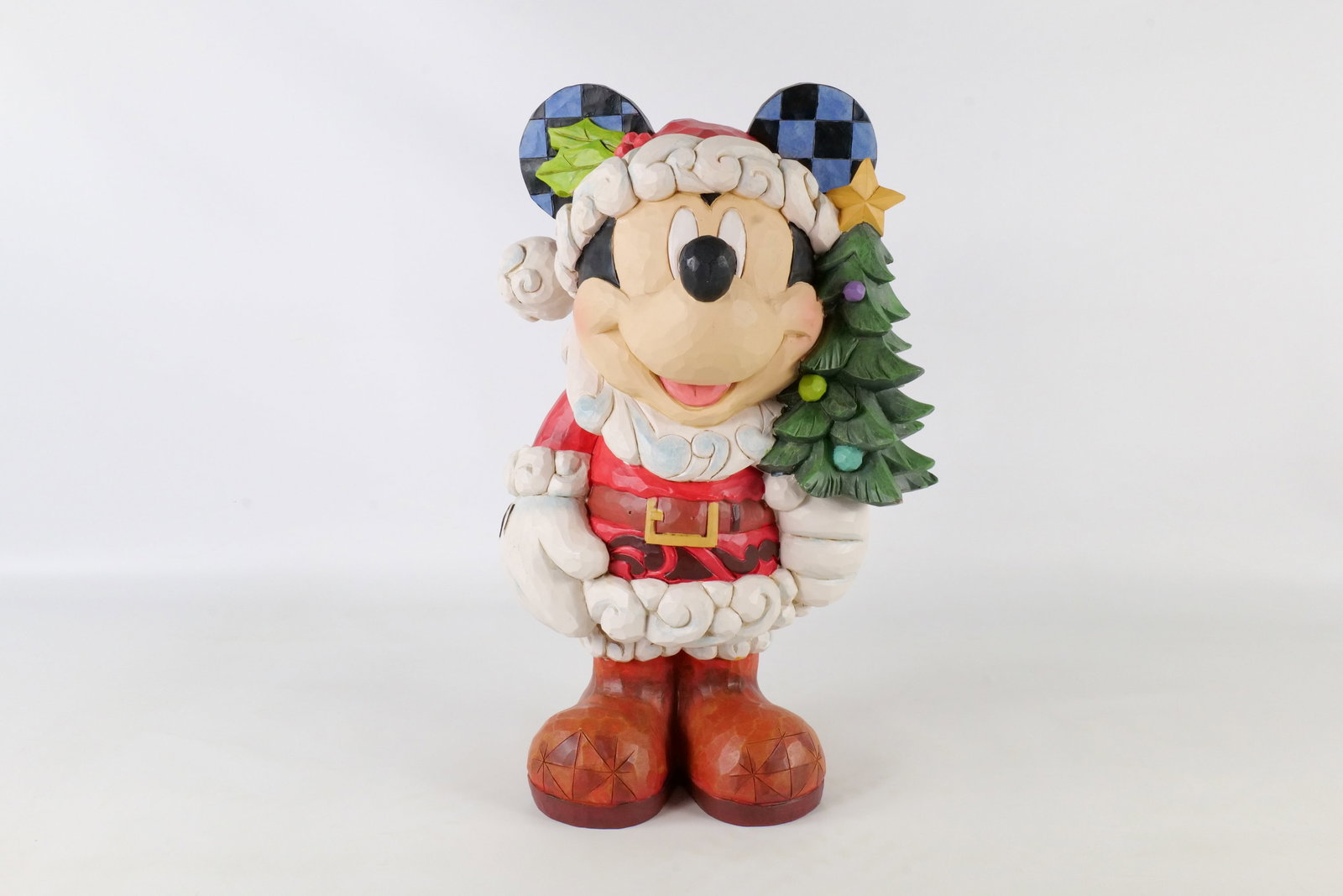 Jim Shore Disney Traditions "Old St. Mick" Mickey Mouse Christmas Statue: Jim Shore Disney Traditions "Old St. Mick" Mickey Mouse Christmas Statue. Measures 17 inches tall by 11 inches wide. All invoices must be paid within 24 hours of the sale. We offer multiple shipping o