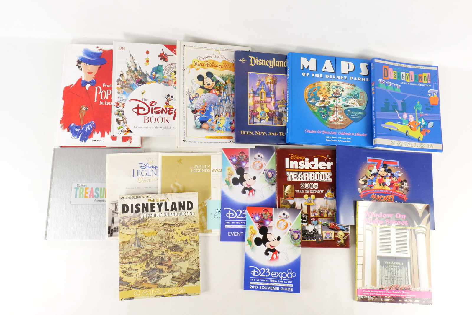 Lot of Disney Books and Auction Catalogs: Lot of Disney Books and Auction Catalogs. Including Practically Poppins in Every Way, the Disney Book, Popping up around Walt Disney World, Disneyland, Window on Main Street, Van Eaton Gallery Auction