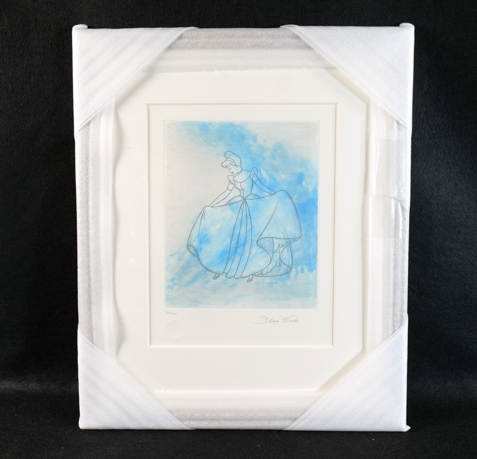 Disney Cinderella Aquatint Framed and Matted Etching: Disney Cinderella Aquatint Framed and Matted Etching. Done by artist Irene Woods. Signed by Irene Woods and numbered 138 of 500. New condition. Comes with the original price tag and COA on the back. M
