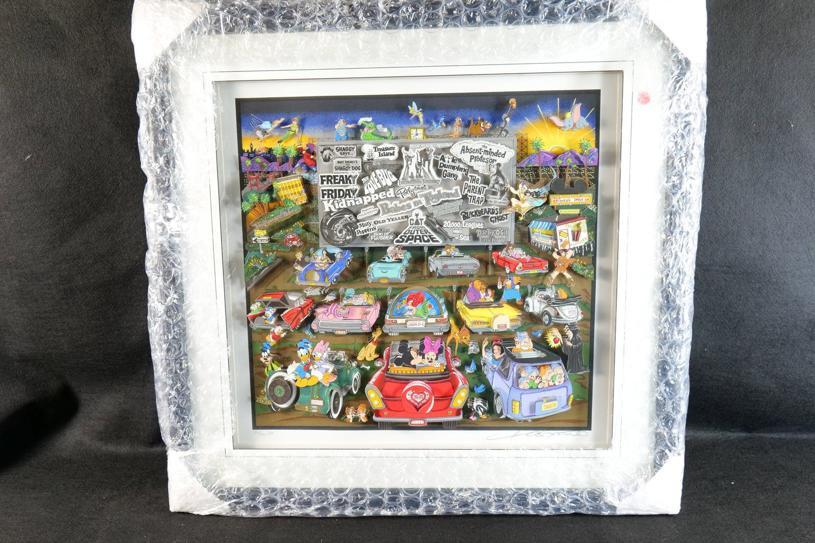 Charles Fazzino Disney Drive-In 3D Pop Art Deluxe Edition: Charles Fazzino Disney Drive-In 3D Pop Art Deluxe Edition. Depicts various Disney characters in cars inspired by classic drive in movie theaters. Limited Edition 34# of 325. Signed and numbered on the