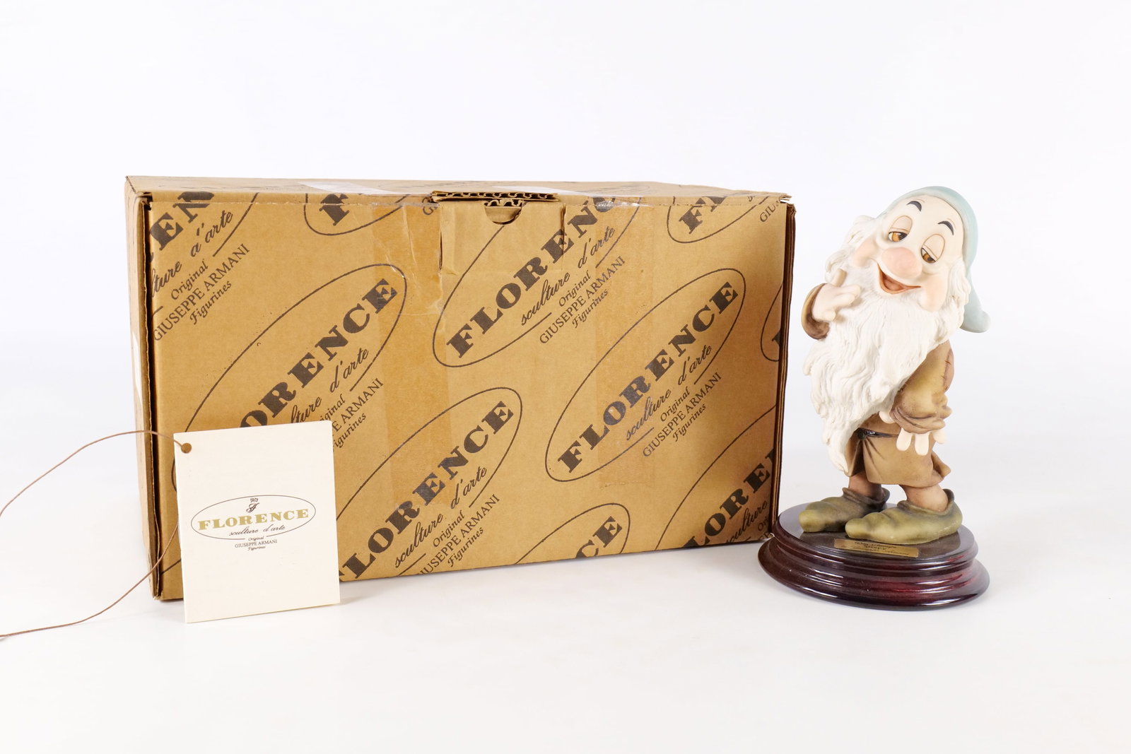 Disney Armani Sleepy Dwarf Figurine: Disney Giuseppe Armani Snow White Sleepy Dwarf Figurine - 915C . Measures 7 inches tall by 3.75 inches wide. Comes with original box and paperwork. All invoices must be paid within 24 hours of the sal