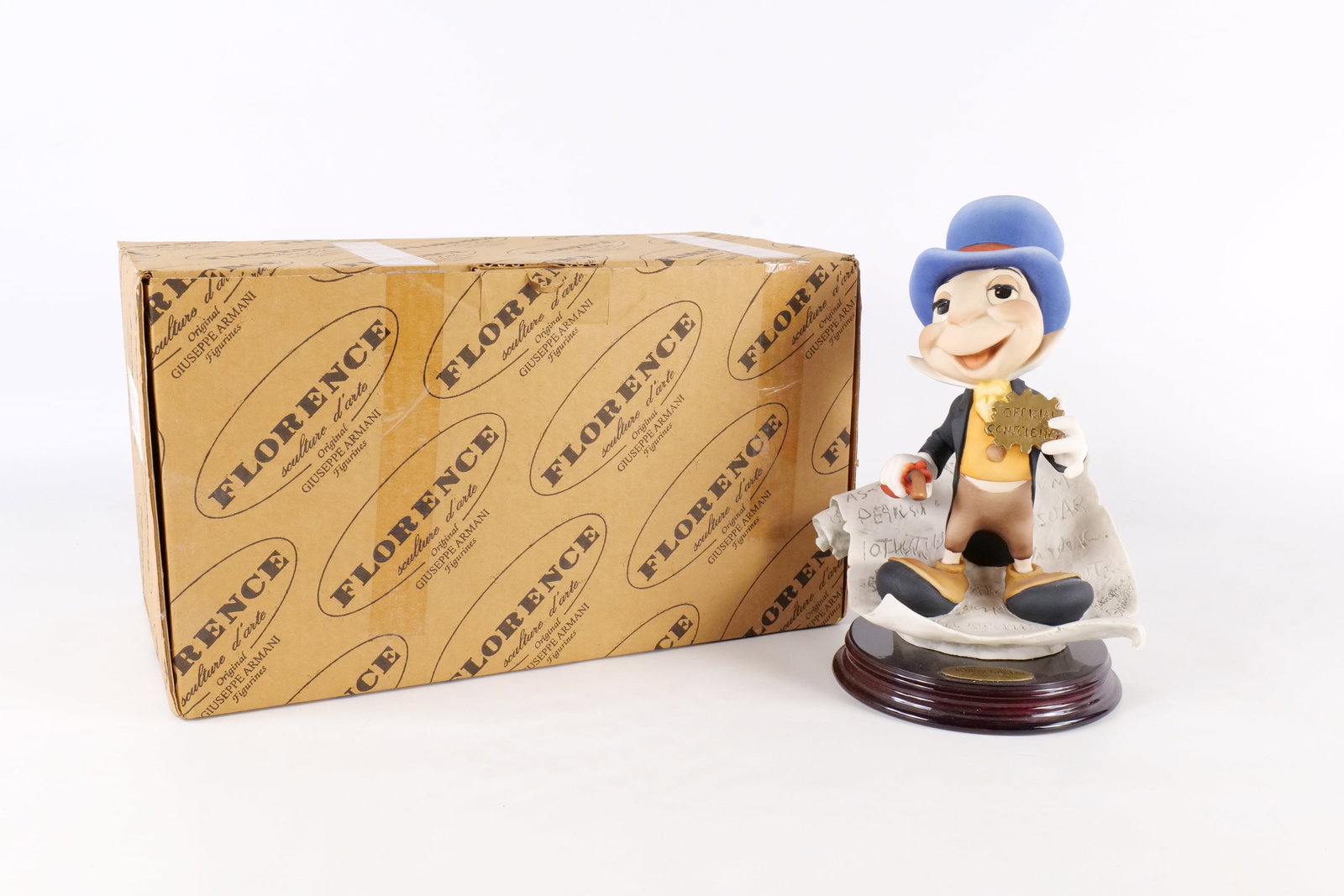 Disney Giuseppe Armani Jiminy Cricket Figurine: Disney Giuseppe Armani Jiminy Cricket Figurine. Number 379C . Comes with original box. Measures 9 1/2 inches tall by 7 inches wide. All invoices must be paid within 24 hours of the sale. We offer mult