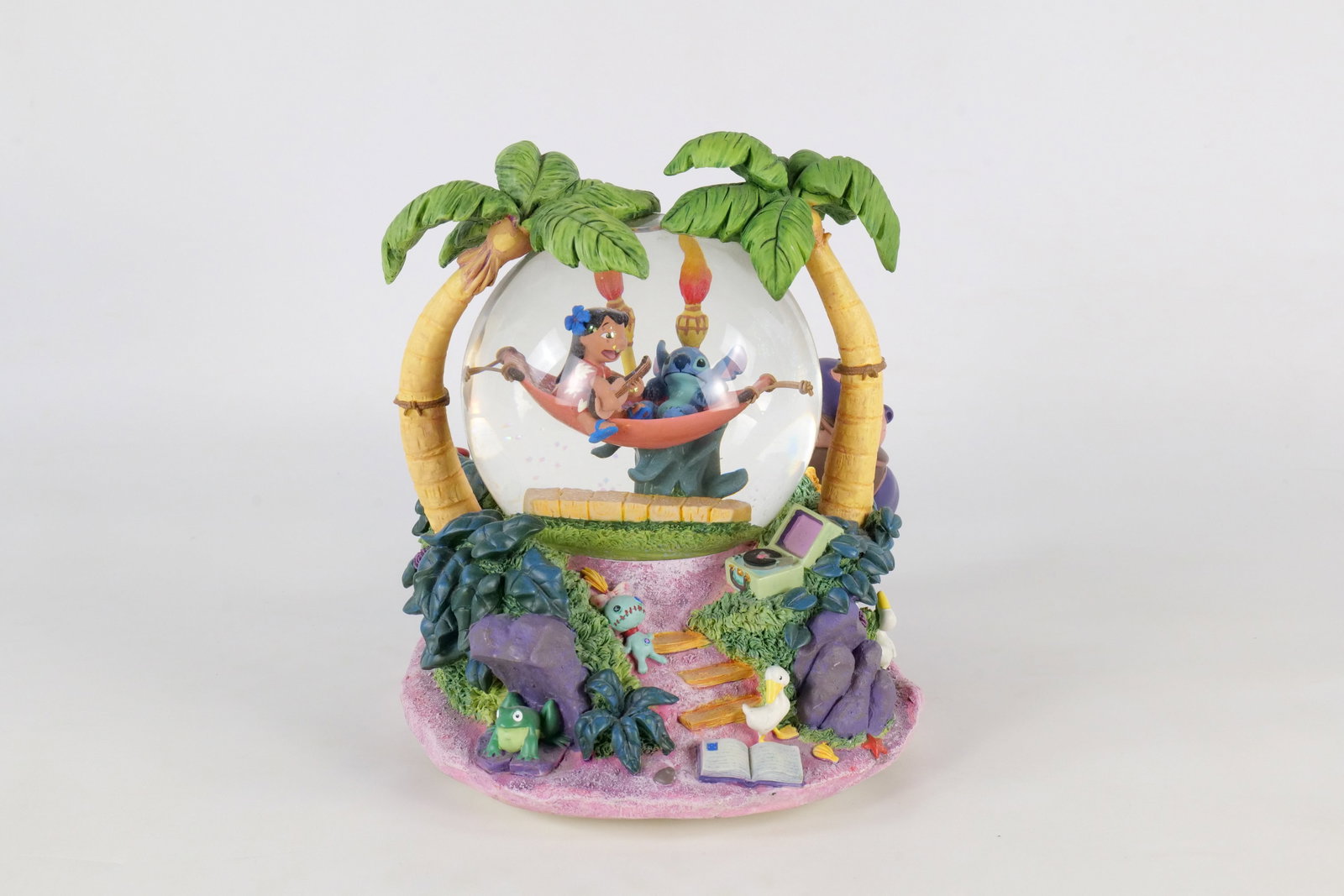 Disney Lilo and Stitch "Aloha" Musical Snow Globe: Disney Lilo and Stitch "Aloha" Musical Snow Globe. Tested and working Measures 8 1/2 inches tall by 8 inches wide. All invoices must be paid within 24 hours of the sale. We offer multiple shipping opt