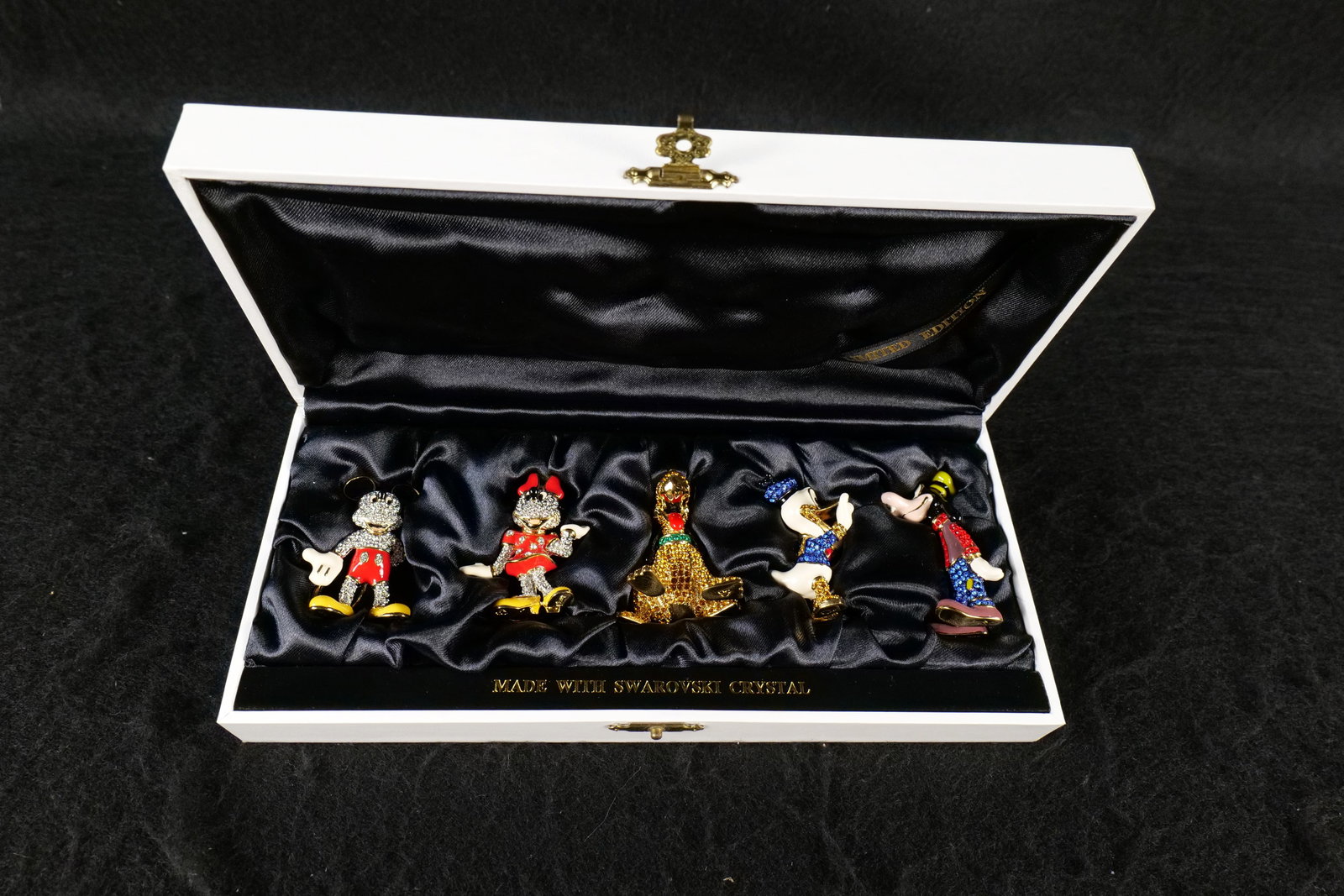 Disney Swarovski Arribas Bros. Fab 5 Crystal Figurine Set: Disney Swarovski Arribas Bros. Fab 5 Crystal Figurine Set. Made with Swarovski Crystal. Includes Mickey Mouse, Minnie Mouse, Pluto, Donald Duck, and Goofy. Tallest measures 2.25 inches . Comes with