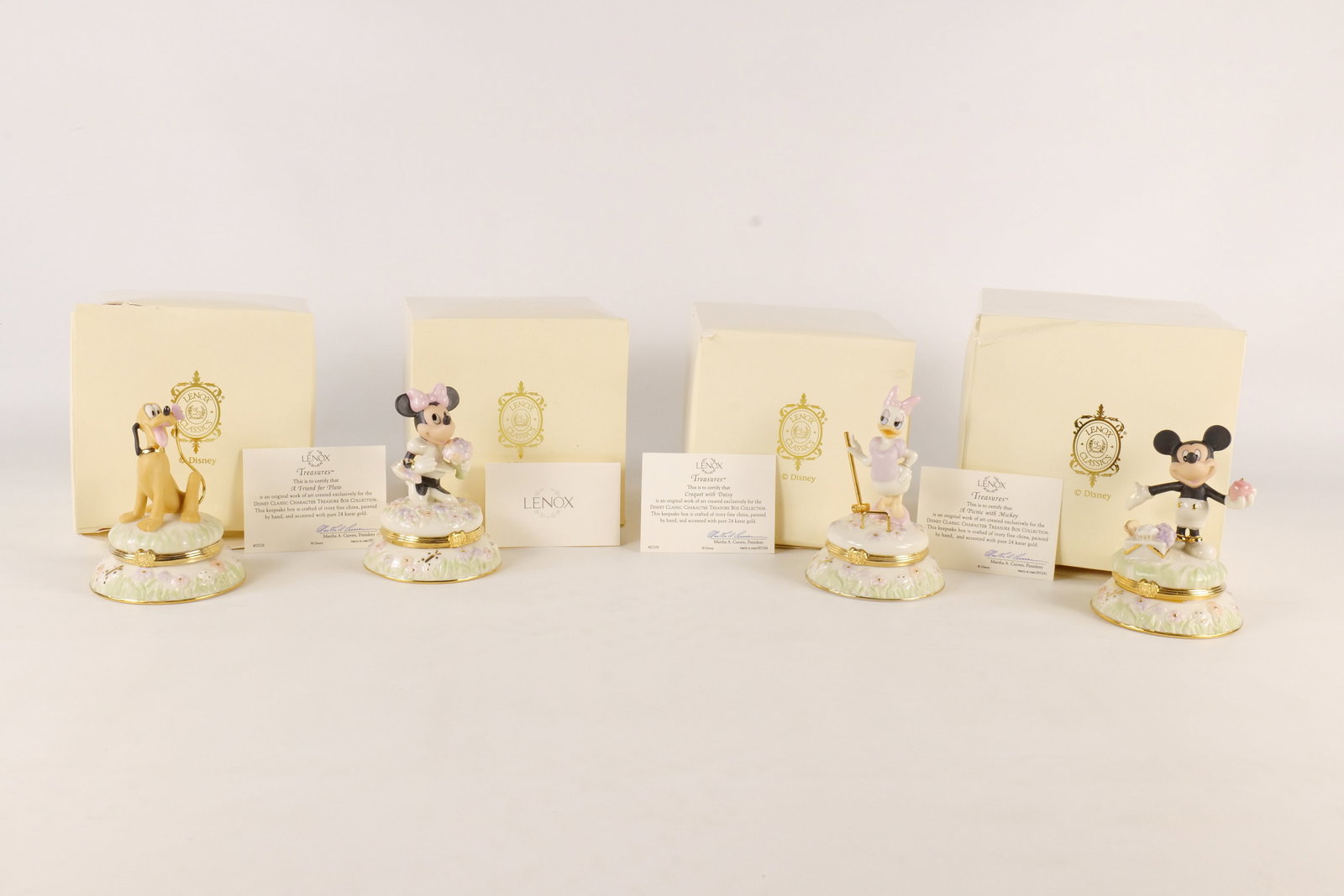 Lot of 4 Lenox Disney Treasures Trinket Box Figurines: Lot of 4 Lenox Disney Treasures Trinket Box Figurines. Including A Picnic with Mickey, Blooms for Minnie, A Friend for Pluto, and Croquet with Daisy. All in good condition with trinkets inside. All