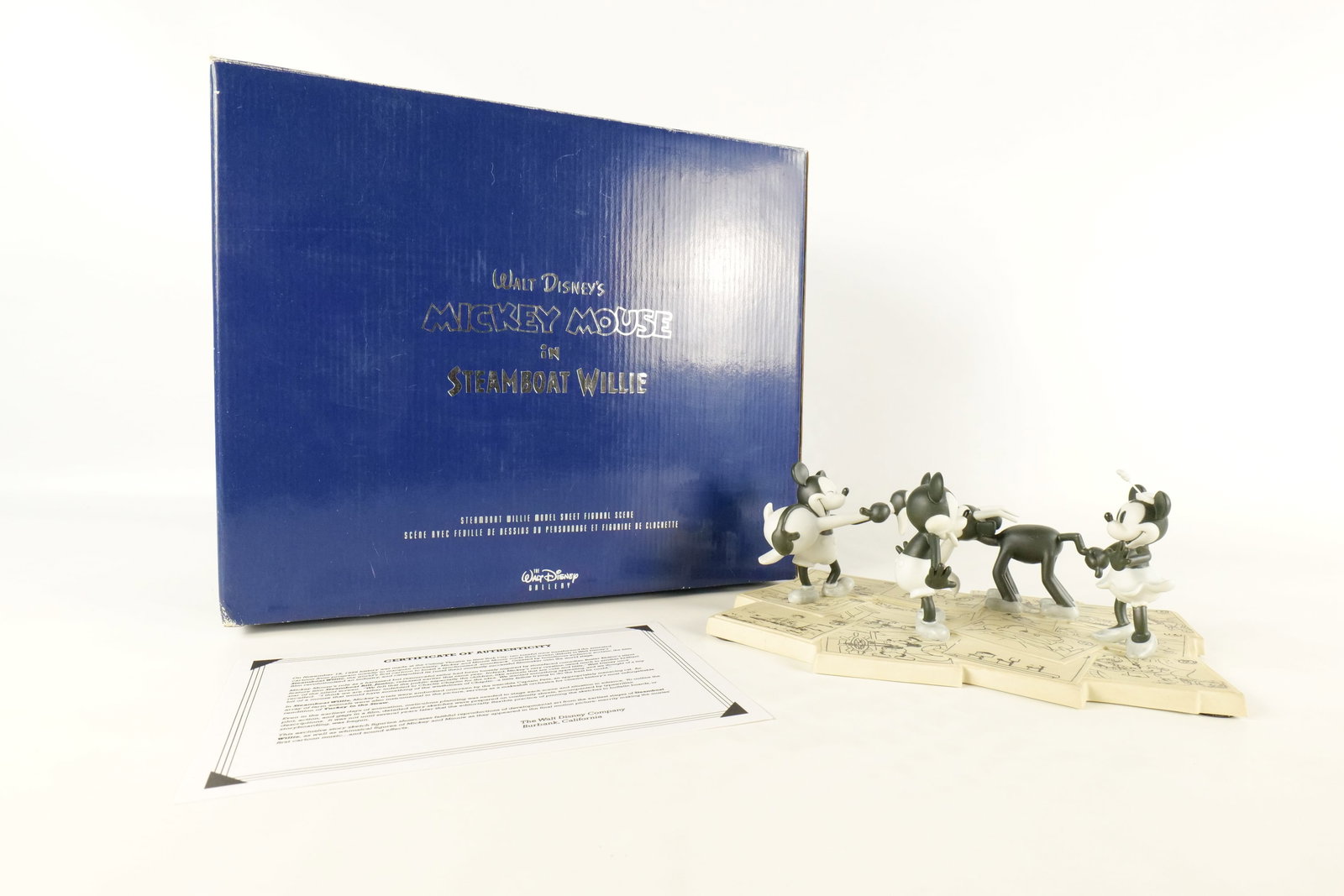 Walt Disney Mickey Mouse as Steamboat Willie Model Sheet Figural Scene: Walt Disney Mickey Mouse as Steamboat Willie Model Sheet Figural Scene. Comes with COA. Limited Edition #992 out of 3000. Comes with original box. Measures 4 inches tall by 10 inches wide. All