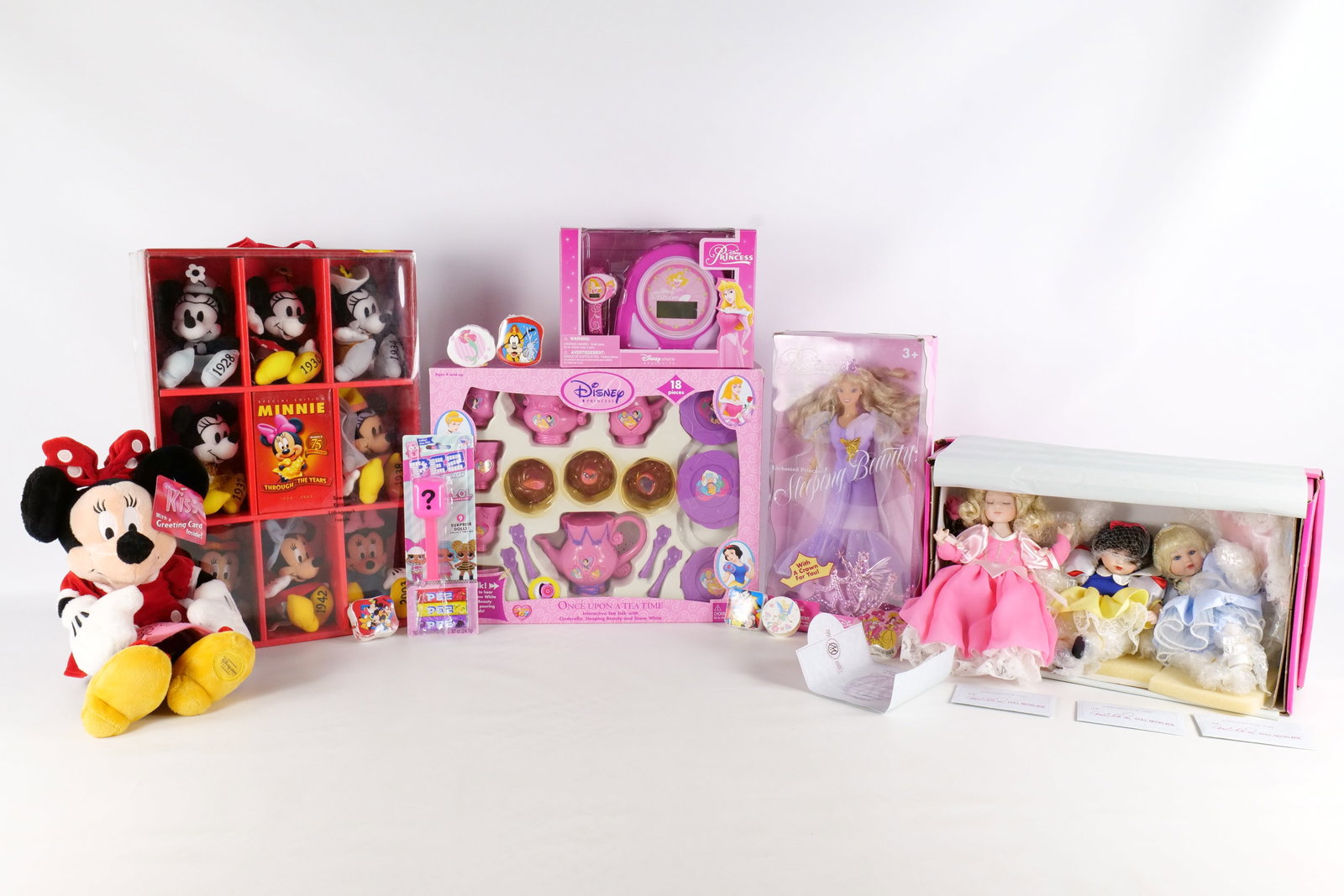 Lot of Disney Girls/Princess Toys: Lot of Disney Girls/Princess Toys. Including Minnie 75th Anniversary - Minnie Through the Years Plush Set, Disney Princess - Enchanted Sleeping Beauty Doll, Marie Osmond Disney Tiny Tots Trio Doll Set