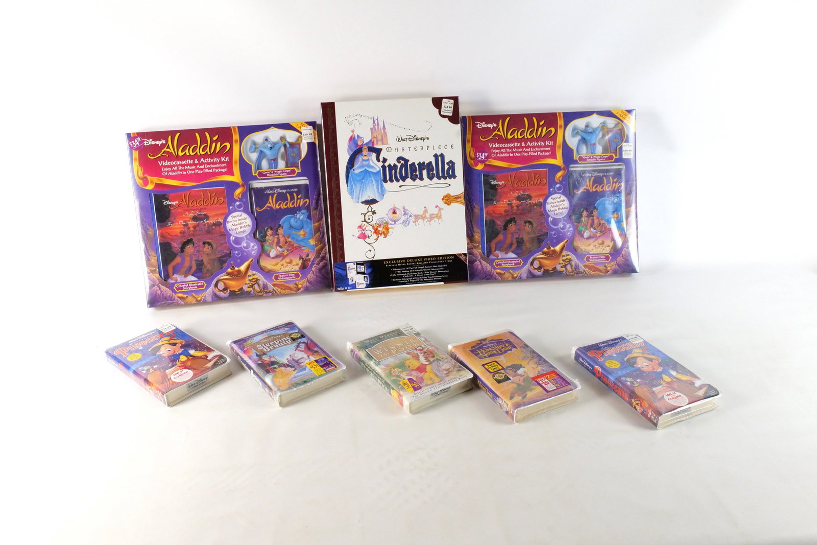 Lot of Sealed Disney VHS: Lot of Sealed Disney VHS. Including 2 x Aladdin Videocassette and Activity Kit, Masterpiece Cinderella Deluxe Set, 2 x Pinocchio, Sleeping Beauty, Winnie the Pooh, and The Hunchback of Notre Dame. All