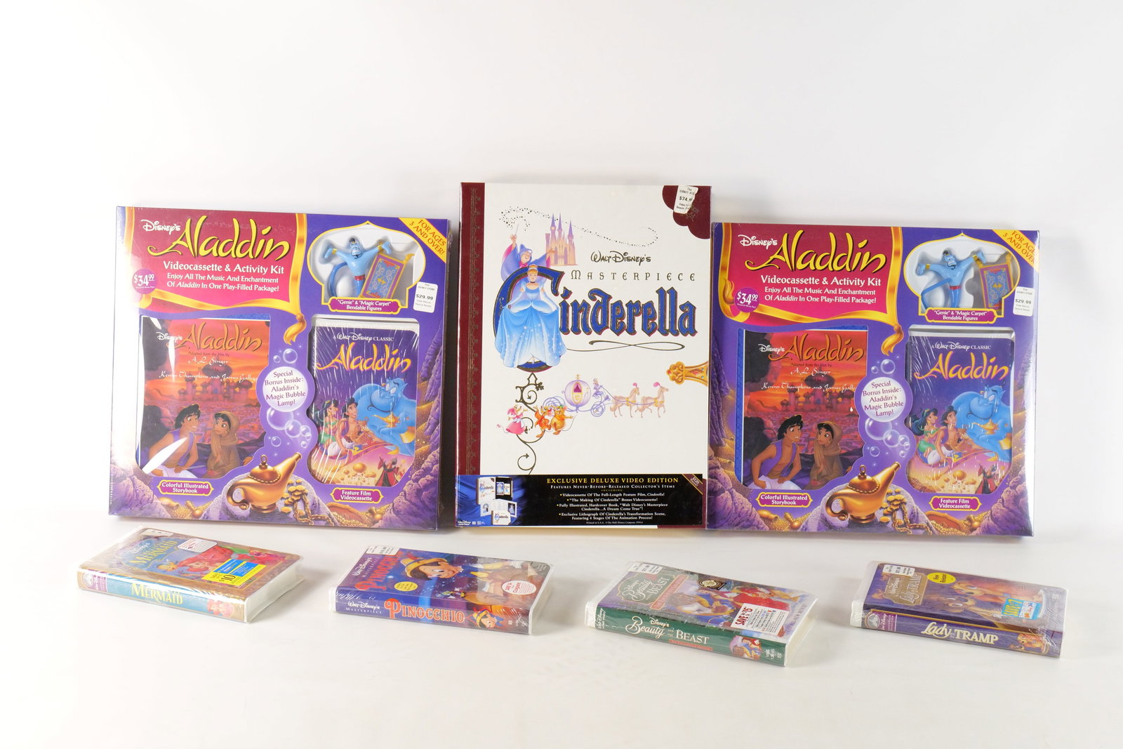 Lot of Sealed Disney VHS: Lot of Sealed Disney VHS. Including 2 x Aladdin Videocassette and Activity Kit, Masterpiece Cinderella Deluxe Set, Pinocchio, Lady and the Tramp, Beauty and the Beast Enchanted Christmas, and The Litt