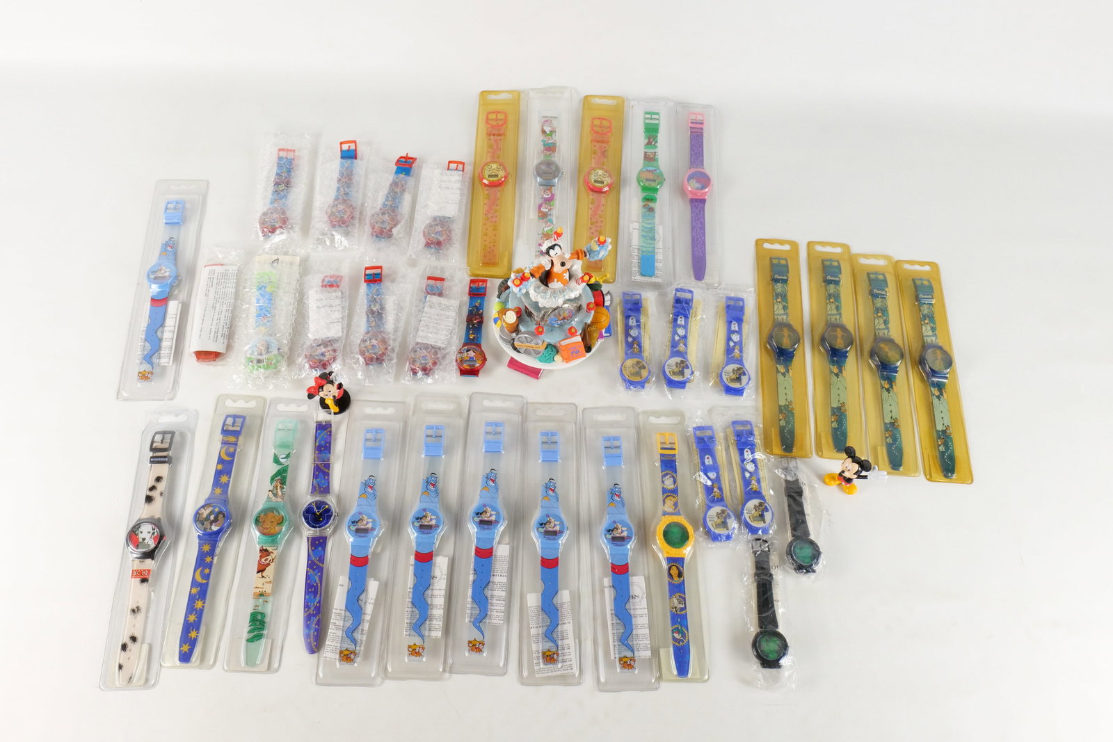 Lot of Disney Children's Watches: Lot of Disney Children's Watches. Including The Fox and The Hound, Pocahontas, Aladdin, The Lion King, 101 Dalmatians, Pinocchio, The Aristocats, Goofy, and More. Almost all are sealed in package. All