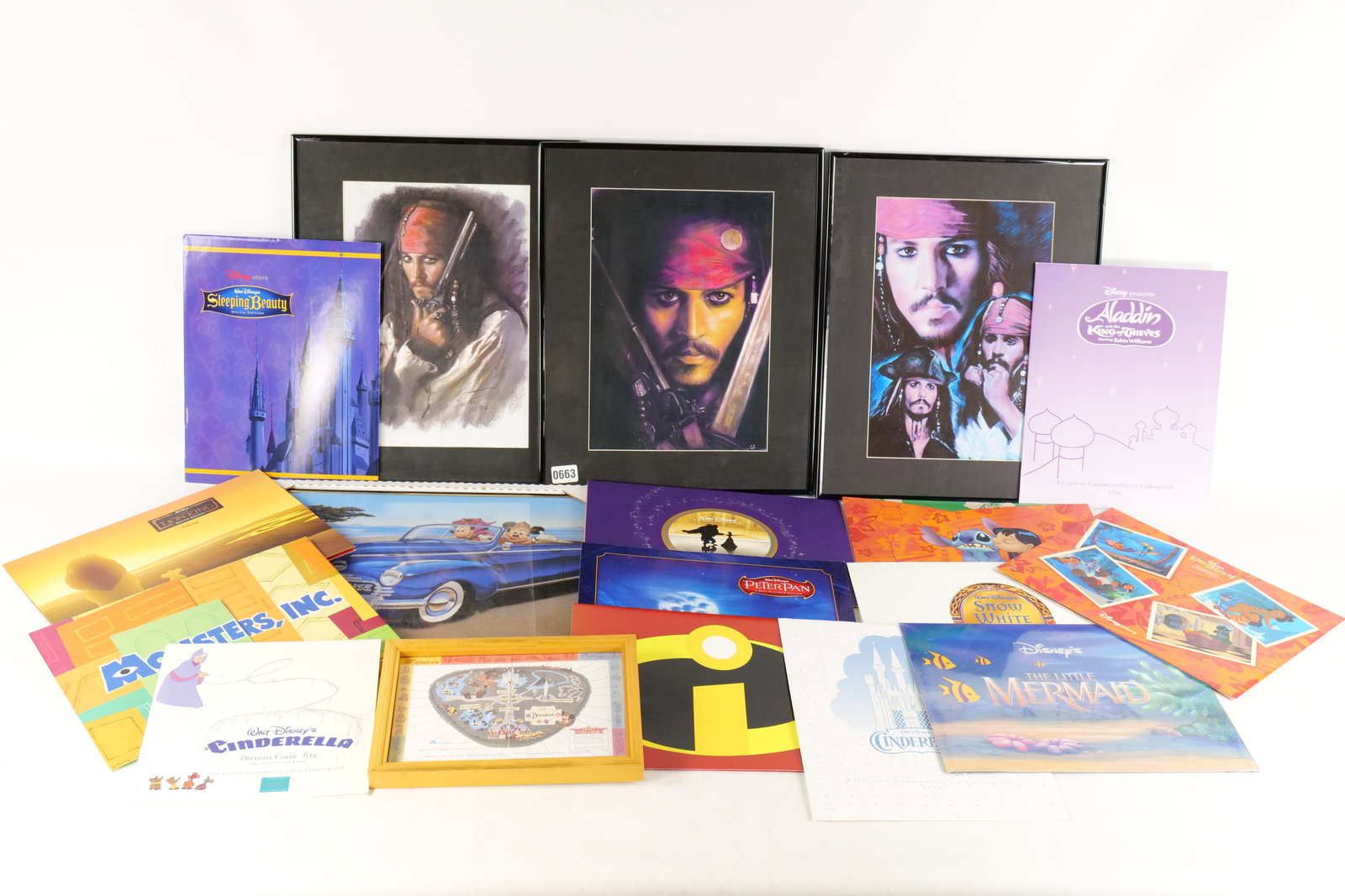 Lot of Disney Prints and Lithographs: Lot of Disney Prints and Lithographs. Including Pirates of the Caribbean Prints, 35th Anniversary Disneyland Print, Various Disney Lithograph Portfolios and More. Some are Framed. Some frames are AS-I