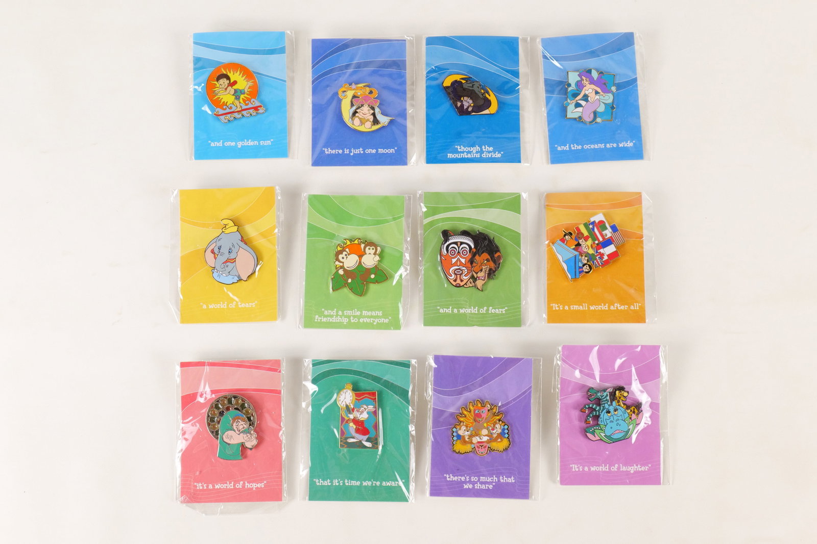 It's a Small World Limited Edition Artist Pin Set: It's a Small World Limited Edition Artist Pin Set. Set contains 12 pins and is complete. Including Dumbo, Scar, Quasimodo, White Rabbit, Chip n Dale, and more. Sealed in package. Limited to 2000 piece