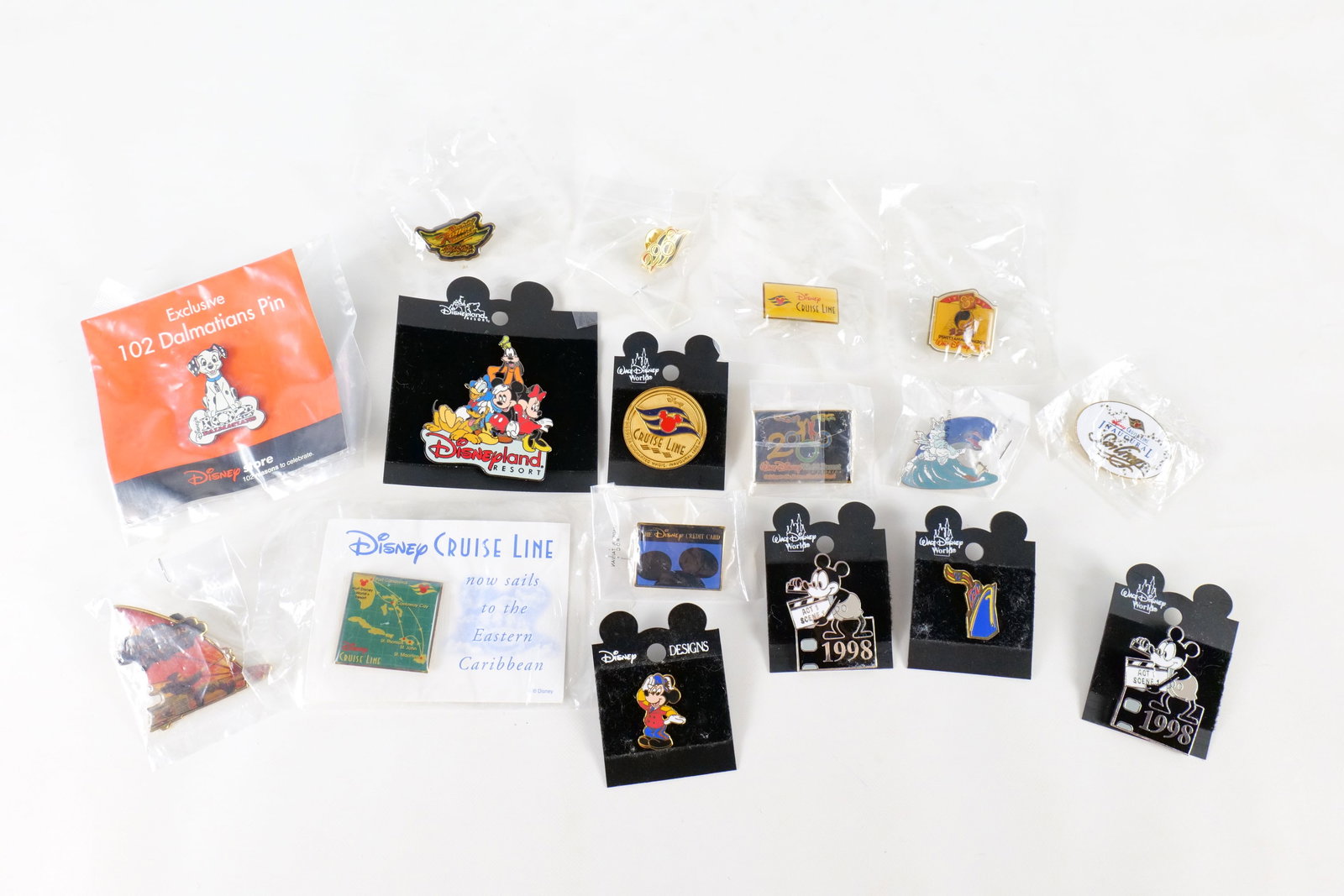 Lot of 17 Disney Pins: Lot of 17 Disney Pins. Including DCL Inaugural Sailings, Treasure Planet , 102 Dalmatians , Monstro Limited Edition 2001 Exclusive , Disneyland Resort, and more. Many pins come on card back or are sea