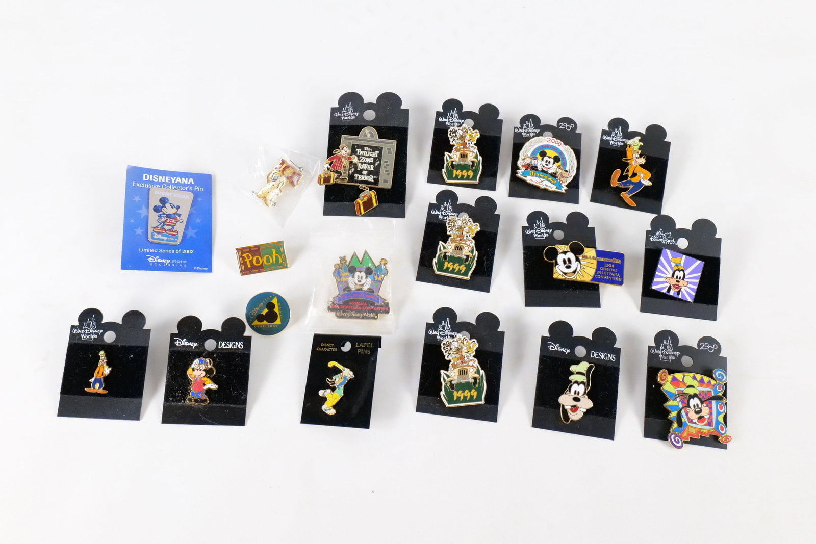 Lot of 18 Disney Pins: Lot of 18 Disney Pins. Including Various Goofy, Twilight Zone Tower of Terror, Various Disney Conventions, Disney Store , Pooh, 101 Dalmatians and more. Many pins come on card back or are sealed in pa