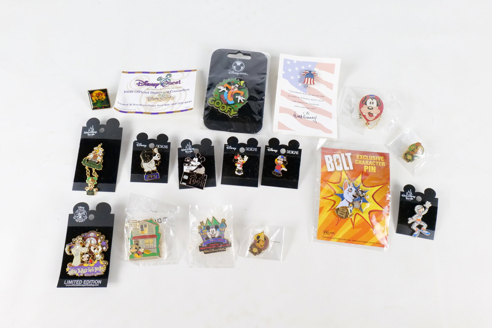 Lot of 17 Disney Pins: Lot of 17 Disney Pins. Including Disney Quest, Bolt Character, Various Conventions, Goofy in a Balloon, New Year's Eve 2002 - Limited Edition , Disneyland 35th Anniversary, and more. Many pins come on