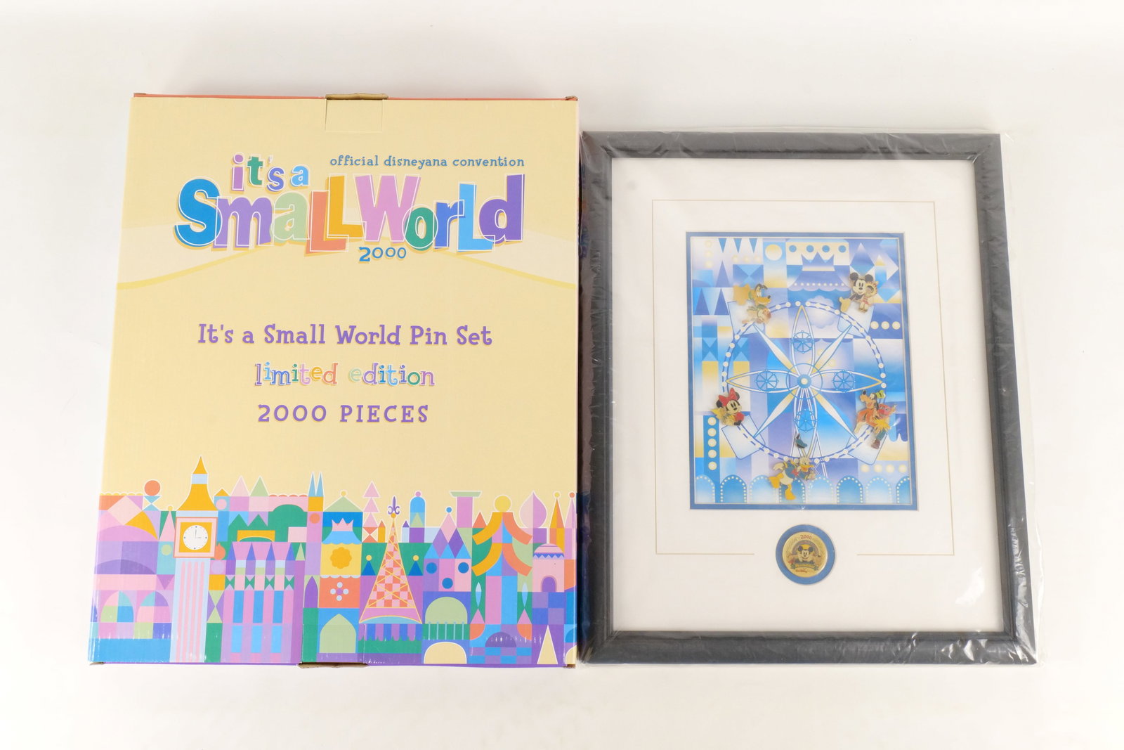 Disneyana Convention It's a Small World Framed Pin Set: Official Disneyana Convention It's a Small World Limited Edition Framed Pin Set. Limited to 2000 pieces. Comes with original box. Measures 18 1/2 inches tall by 15 inches wide. All invoices must be pa