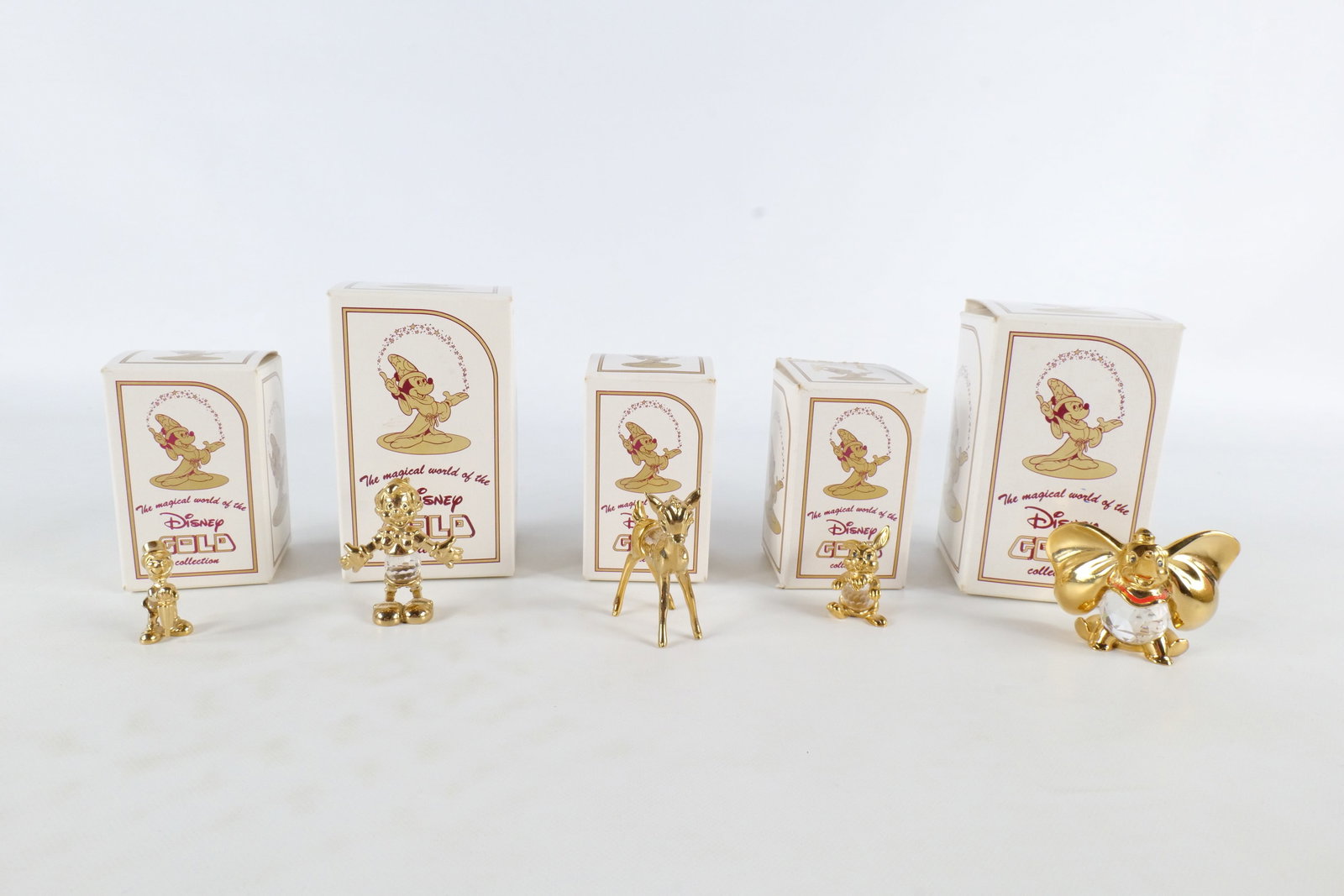 Lot of 5 Disney Lencia Austria 24K Gold Plated and Crystal Figurines: Lot of 5 Disney Lencia Austria 24K Gold Plated and Crystal Figurines. Including Dumbo, Bambi, Thumper, Pinocchio, and Jiminy Cricket. Tallest measures 2 inches. All invoices must be paid within 24 hou