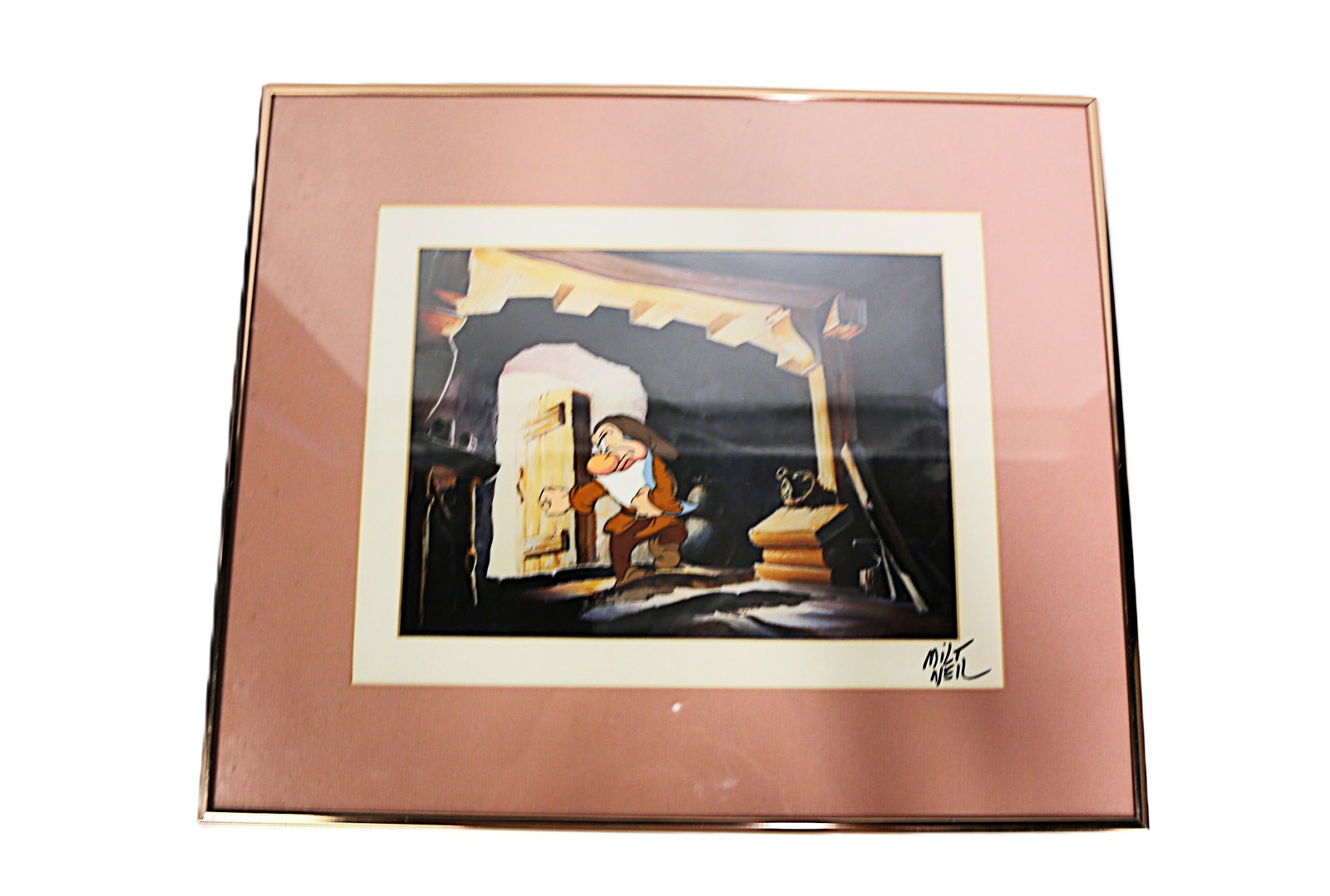 Disney Original Production Cel - Grumpy in Mine: Disney Original Production Cel - Grumpy in Mine. Framed and matted. Signed on Matte by Milt Neil. Milt worked on Snow White and the Seven Dwarfs. Does not come with a COA. Could be pre-Disney stamp er