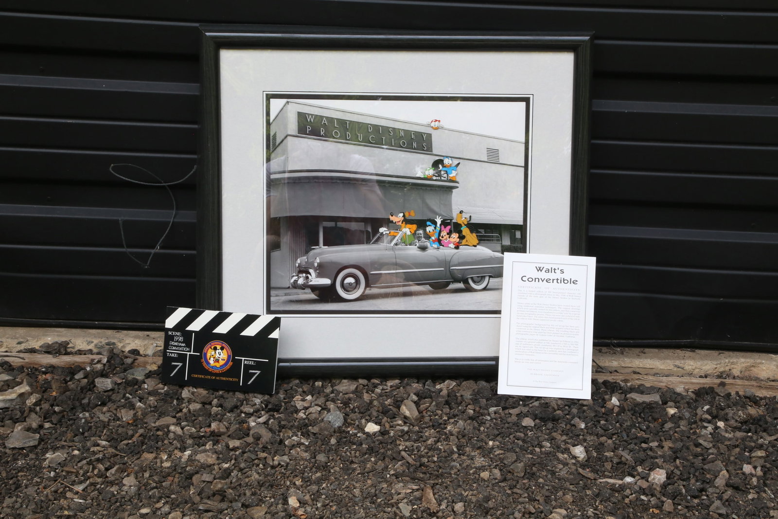 Disney "Walt's Convertible" Hand Painted Character Cel: Disney "Walt's Convertible" Hand Painted Character Cel. Combined with a photograph taken in May 1948 outside the main gate of Disney Studios in Burbank California. Limited Edition #152 of 500. Has the