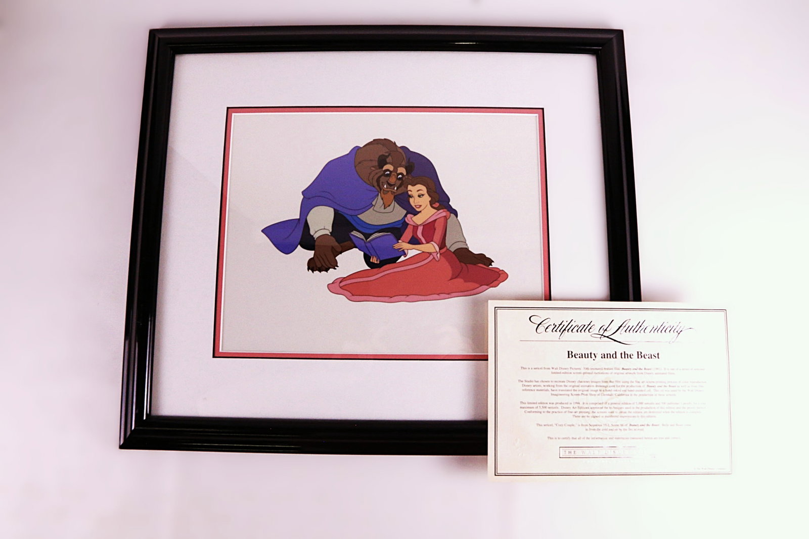 Disney Beauty and the Beast Sericel - "Cozy Couple": Disney Beauty and the Beast Sericel - "Cozy Couple". Limited edition to 5000 pieces. Comes with COA. Framed and matted. Measures 18 1/2 inches tall by 21.25 inches wide. All invoices must be paid with