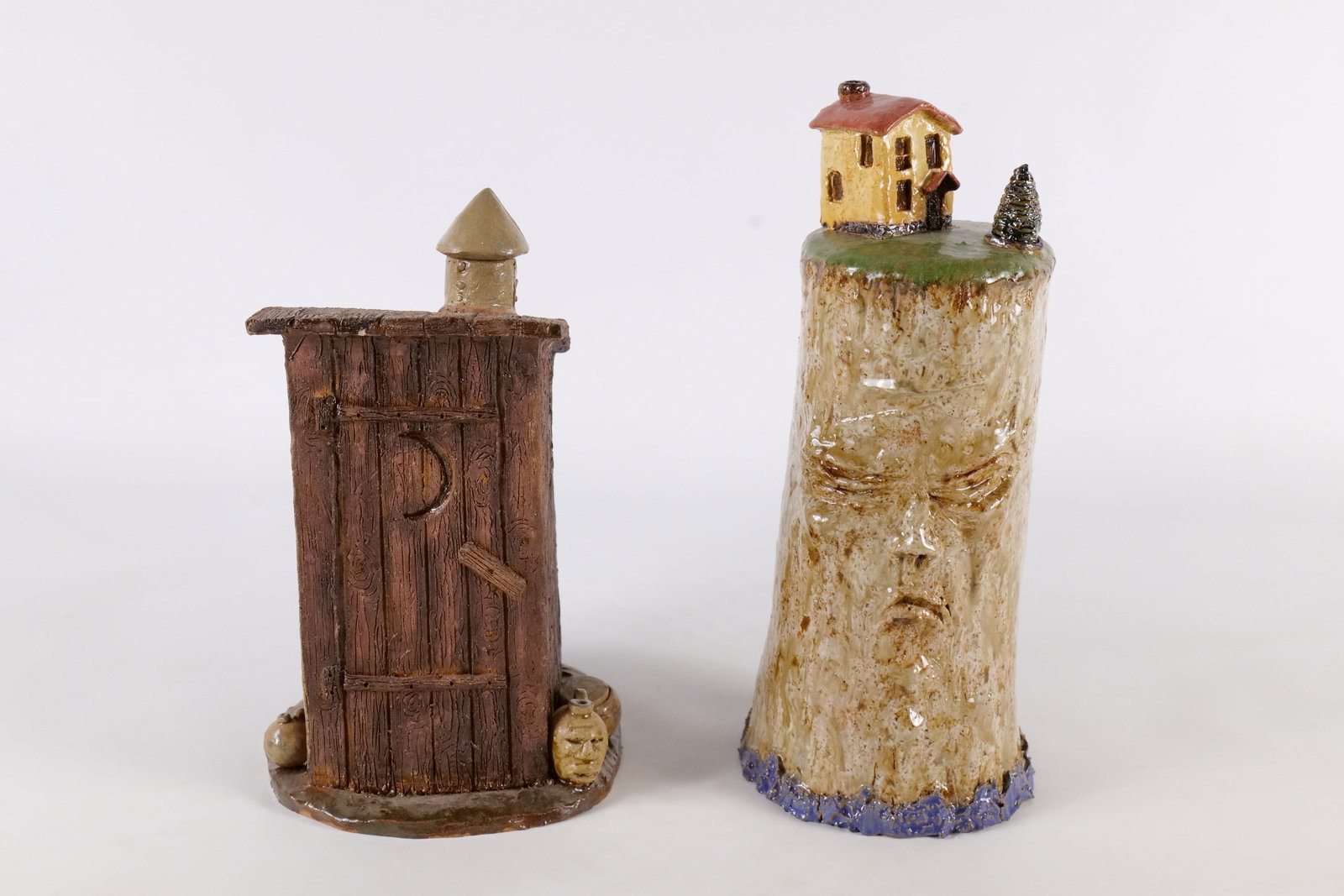 Lot of 2 Vintage Ed Berdej Studio Art Pottery Whimsical Pitcher/Vessels: Lot of 2 Vintage Ed Berdej Studio Art Pottery Whimsical Pitcher/Vessels. Including a tree stump/man face vessel featuring a miniature cottage, a pine cone, and a top spout opening with a rear handle a
