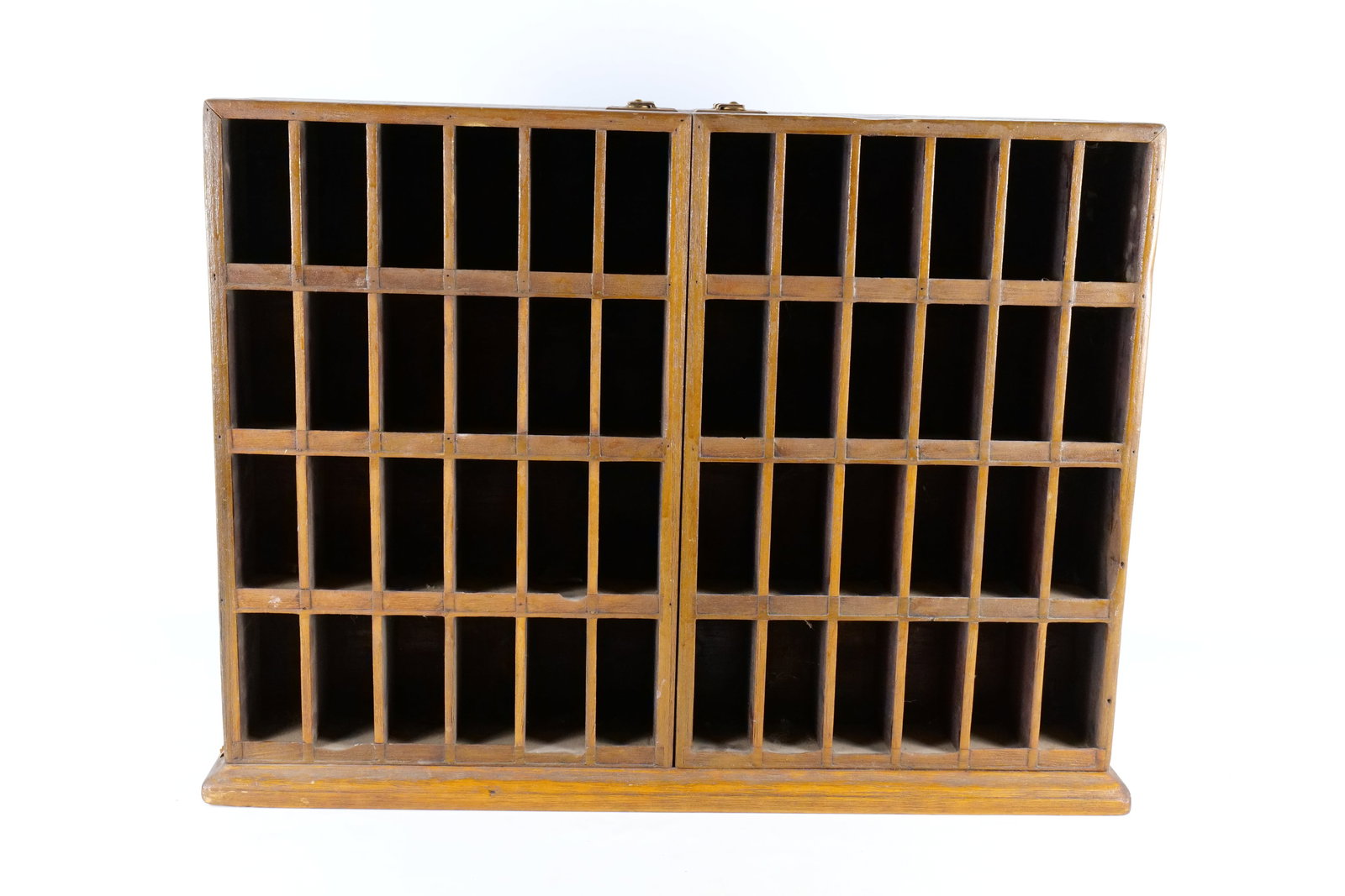 Antique Wooden Specimen Cabinet with Cubby Doors: This antique wooden cabinet is a specialized storage unit designed for scientific, apothecary, or collector use. The rectangular case features a unique design with two deep doors that, when closed, pr