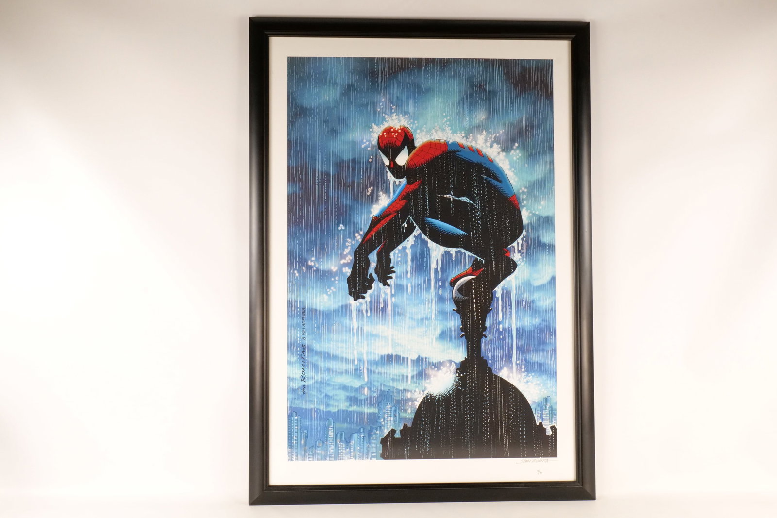 Marvel Spider-Man "In the Rain" Fine Art Print/Giclee - Signed: Marvel Spider-Man "In the Rain" Fine Art Print/Giclee - Signed by John Romita - Limited edition #4/99. Framed and matted. Measures 47 inches tall by 33 1/2 inches wide. 100% of all proceeds in this lo