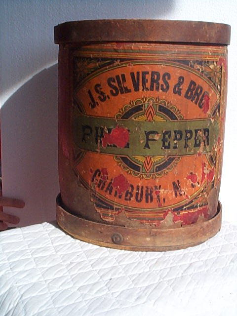 J.S. Silvers and Bro. Pure Pepper wooden barrel, C: J.S. Silvers and Bro. Pure Pepper wooden barrel, Cranbury, NJ. Paper label does have loss. However, front design is 85% in tact. Measures 12.5"tall by 10.5" diameter. Buyer to pay $20.00 shipping and