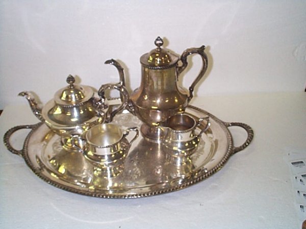 Five piece silver plated tea set. Includes a Will