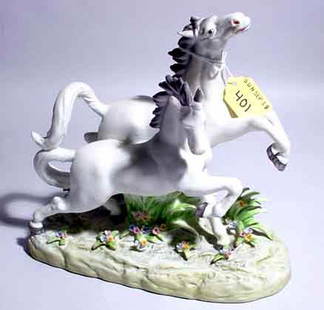 ANDREA DECORATED BISQUE PORCELAIN FIGURAL GROUP: ANDREA DECORATED BISQUE PORCELAIN FIGURAL GROUP, depicting two galloping horses; 8-3/4 inch length; 8-1/2 inch height