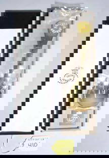 GEORG JENSEN GOLD-PLATED STERLING SPOON: GEORG JENSEN GOLD-PLATED STERLING SPOON, decorated with an enamel daisy, bearing the Jensen mark, in the original box; 5-3/4 inch length