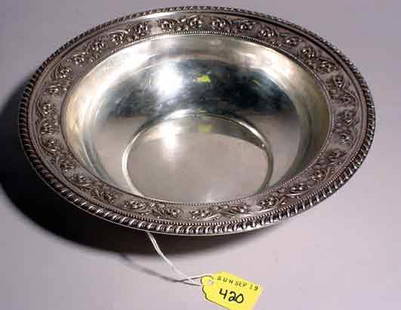 STERLING SILVER CIRCULAR BOWL: STERLING SILVER CIRCULAR BOWL, by Whiting, having a gadrooned edge, with floral decorations; 9-3/4 inch diameter; 2-1/2 inch height