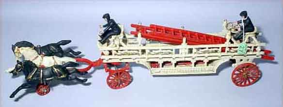 CAST IRON HOOK AND LADDER FIREWAGON, 20th century,: CAST IRON HOOK AND LADDER FIREWAGON, 20th century, pulled by three horses; overall length 28 inches (losses and repairs) (Est. 100-150)