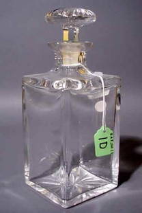 MOULDED SQUARE CRYSTAL DECANTER, having a facete: MOULDED SQUARE CRYSTAL DECANTER, having a faceted stopper; 9-1/2 inch height NOTE: Sold for the benefit of the Museum of Fine Arts, Houston