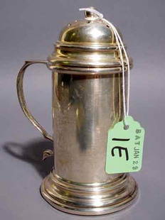 FRANK WHITING STERLING SUGAR CASTER, of cylindri: FRANK WHITING STERLING SUGAR CASTER, of cylindrical form with a scrolling handle; 5-1/4 inch height NOTE: Sold for the benefit of the Museum of Fine Arts, Houston