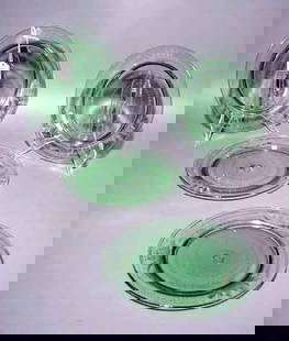 SET OF TWELVE ETCHED EMERALD GLASS LUNCHEON PLAT: SET OF TWELVE ETCHED EMERALD GLASS LUNCHEON PLATES, the decorations depicting sailing ships; 9 inch diameter NOTE: Sold for the benefit of the Museum of Fine Arts, Houston