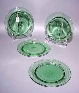 SET OF TWELVE ETCHED EMERALD GLASS LUNCHEON PLAT: SET OF TWELVE ETCHED EMERALD GLASS LUNCHEON PLATES, the decorations depicting sailing ships; 9 inch diameter NOTE: Sold for the benefit of the Museum of Fine Arts, Houston