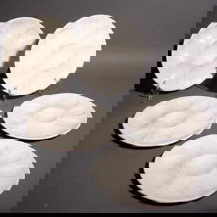 SET OF TWELVE ITALIAN BLANC DE CHINE CERAMIC OYS: SET OF TWELVE ITALIAN BLANC DE CHINE CERAMIC OYSTER PLATES, each with eight wells and a center sauce well; 9-1/2 inch diameter NOTE: Sold for the benefit of the Museum of Fine Arts,