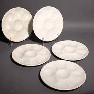 SET OF TWELVE ITALIAN BLANC DE CHINE CERAMIC OYS: SET OF TWELVE ITALIAN BLANC DE CHINE CERAMIC OYSTER PLATES, each with eight wells and a center sauce well; 9-1/2 inch diameter NOTE: Sold for the benefit of the Museum of Fine Arts,