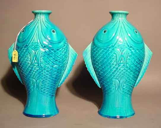 PAIR OF GLAZED CERAMIC FISH DESIGN VASES, depicte: PAIR OF GLAZED CERAMIC FISH DESIGN VASES, depicted standing on their tails; 13 inch height (Est. 40-60 the Pair) NOTE: Sold for the benefit of the Museum of Fine Arts, Houston