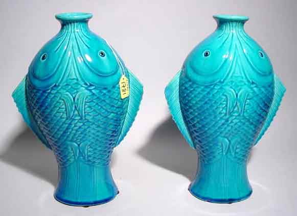 PAIR OF GLAZED CERAMIC FISH DESIGN VASES, depicte: PAIR OF GLAZED CERAMIC FISH DESIGN VASES, depicted standing on their tails; 13 inch height (Est. 40-60 the Pair) NOTE: Sold for the benefit of the Museum of Fine Arts, Houston